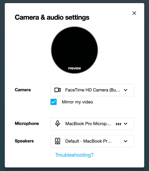 The Camera & audio settings modal window. It displays a circular camera preview at the top. Below are dropdown menus for selecting the "Camera," "Microphone," and "Speakers." A checkbox labeled "Mirror my video" is located under the camera selection"
