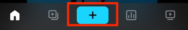 The toolbar of the Vimeo mobile app homepage displaying the navigation bar with a highlighted blue "New Video" button in the middle. It is shaped like a blue rectangle with a black plus sign in the middle.